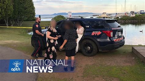 Thunder Bay Police Officer Poses For Photos In Front Of Crime Scene