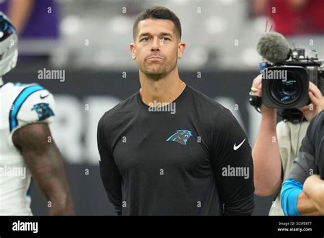 Carolina Panthers head coach Dave Canales watches warm ups prior to an