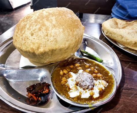 Premium Photo Indian Street Food Called Chole Bhature At Restaurant