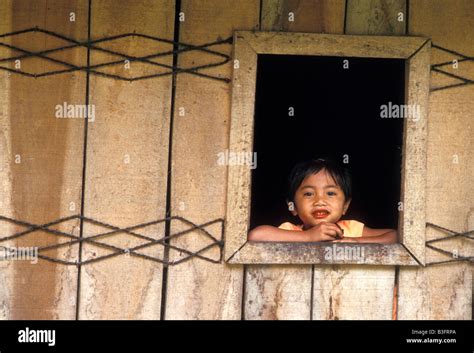 Karo Batak Girl At Front Window Dokan Village Sumatra Indonesia Stock