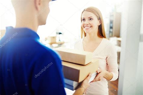 Woman Receiving Packages Stock Photo By Pressmaster