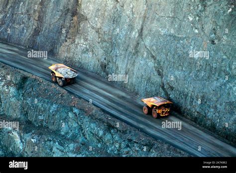 haul trucks passing  haul road super pit gold  kalgoorlie