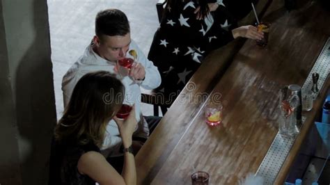 Friends Do Toasts Drink Beer And Cocktails While Having A Good Time Together At A Bar Stock