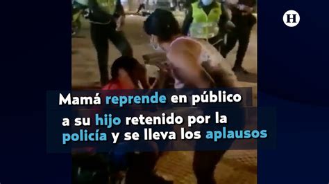 Mamá reprende en público a su hijo retenido por la policía y se lleva