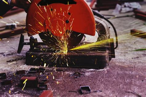 premium photo worker machine cutting