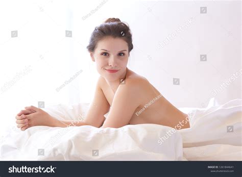 Brunette Woman Lying On Bed Bedroom Stock Photo Edit Now