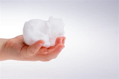 Premium Photo Hand Holding Some Cotton In Hand