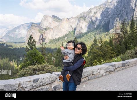 Mature Woman Carrying Granddaughter Yosemite National Park California USA Stock Photo Alamy