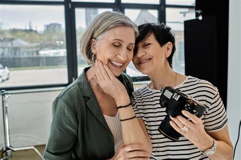 A Middle Aged Lesbian Couple Standing Stock Photo Image Of Confident Collaboration