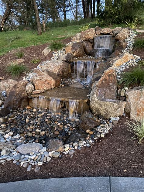 Modern Rock Garden with a Tranquil Waterfall