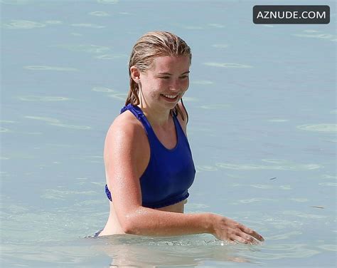 Georgia Toffolo Sexy On The Beach In A Tiny Blue Bikini While On