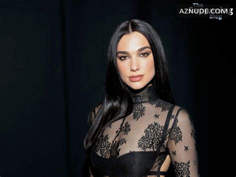 Dua Lipa Sexy Shows Off Her Beautiful Figure In A Hot Transparent Dress At The GCDS Fashion Show