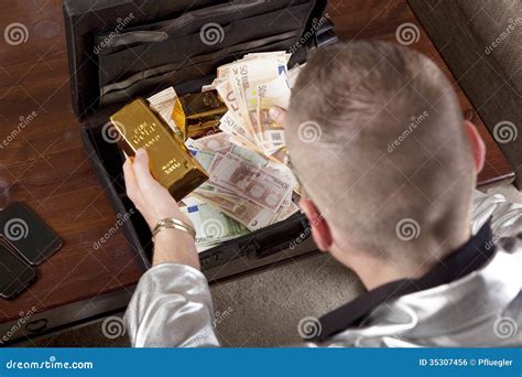 Man With Suitcase Full Of Money And Gold Stock Photo Image Of