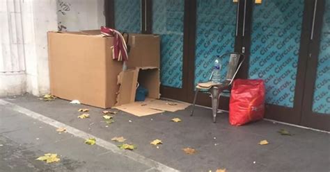 Homeless Person Living In Cardboard Box House In Liverpool City Centre