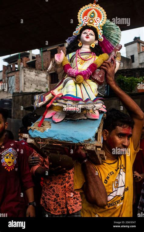 Hindu Devotees Carry An Idol Of The Goddess Durga During The Final Day