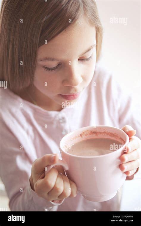 Years Old Girl Drinking Hot Cocoa From The Big Pink Cup Stock Photo