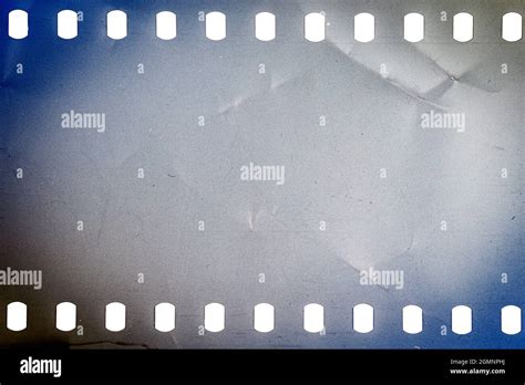Dusty And Grungy 35mm Film Texture Or Surface Perforated Camera Film