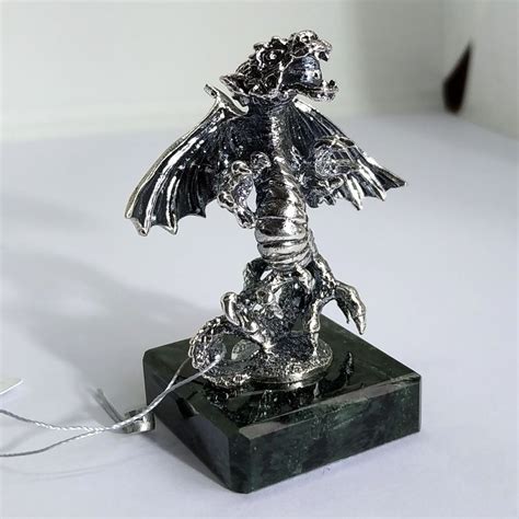 Статуэтка дракон из серебра купить сувенир из серебра.