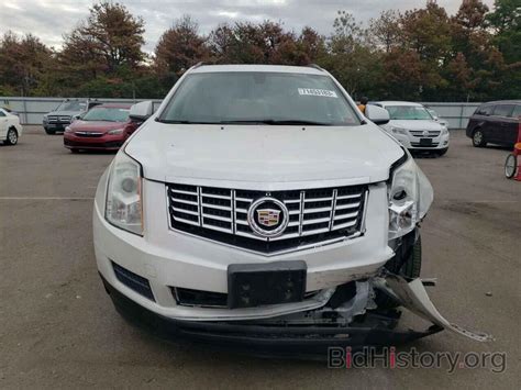 Report 3gyfnae30es688113 Cadillac Srx 2014 White Gas Price And Damage