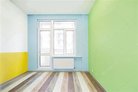 Empty cheerful kids room with color walls — Stock Photo © MWeen #93058738