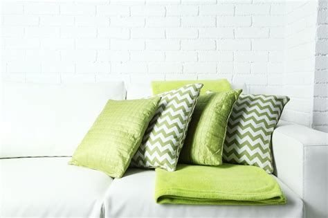 Premium Photo | Colorful pillows on sofa closeup