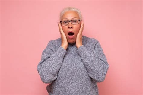 Premium Photo Stressed Surprised Old Mature Woman Looking At Camera Worried About Facial Wrinkles