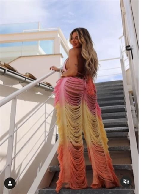 Megan Barton Hanson Sets Pulses Racing In Pink Bikini Top And Cut Out Trousers As She Poses For