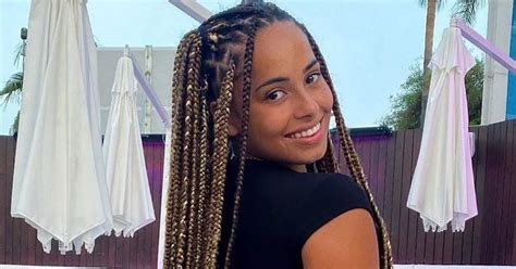 Love Island s Amber Gill unleashes booty in thong bikini for sun kissed exposé Daily Star