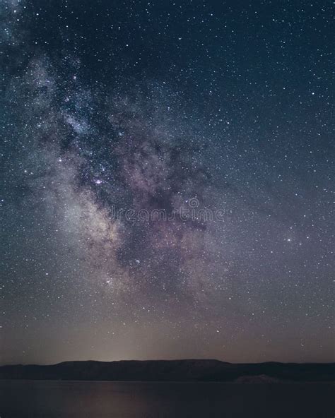 Breathtaking Night Sky Is Illuminated With Stars And A Milky Way