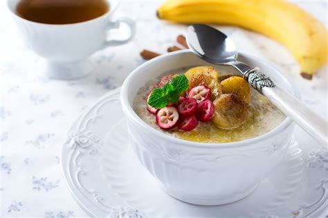 Premium Photo Oat Porridge With Baked Bananas Cinnamon Orange And