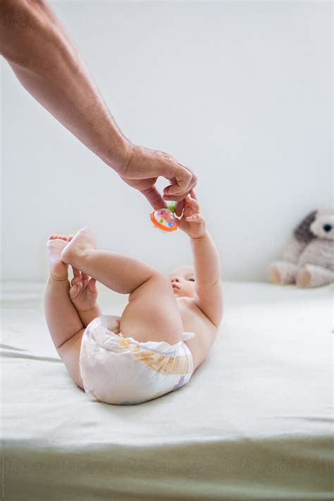 Sweet 6 Months Old Baby Boy Plays With Toys Del Colaborador De