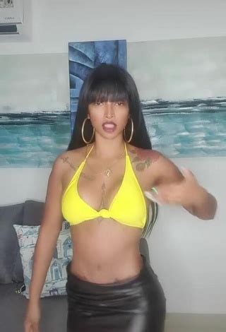 Sexy Aliany García Shows Cleavage in Yellow Bikini Top sexyfilter