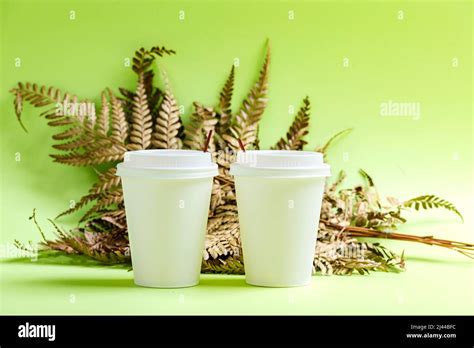 White Plastic Cup With Colored Background Stock Photo Alamy