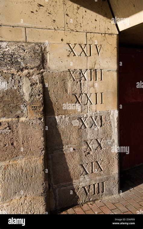 Roman Numerals Carved On Stone Wall Stock Photo Alamy