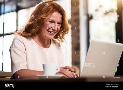 Pretty Senior Businesswoman Using Her Laptop Stock Photo Alamy