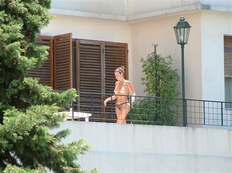 Naked Girl Sunbathing On The Balcony Photos Sex Pics