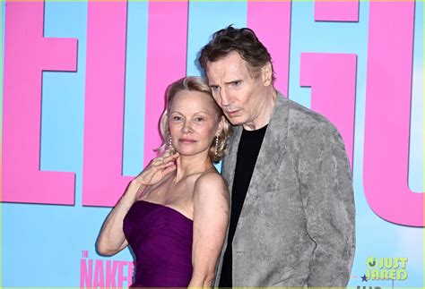 Pamela Anderson Gives Liam Neeson Kiss On The Cheek At The Naked Gun