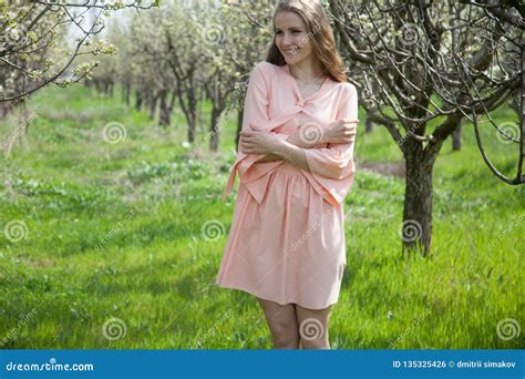 Beautiful Blonde Woman In A Flowered Garden Stock Photo Image Of Garden Face 135325426