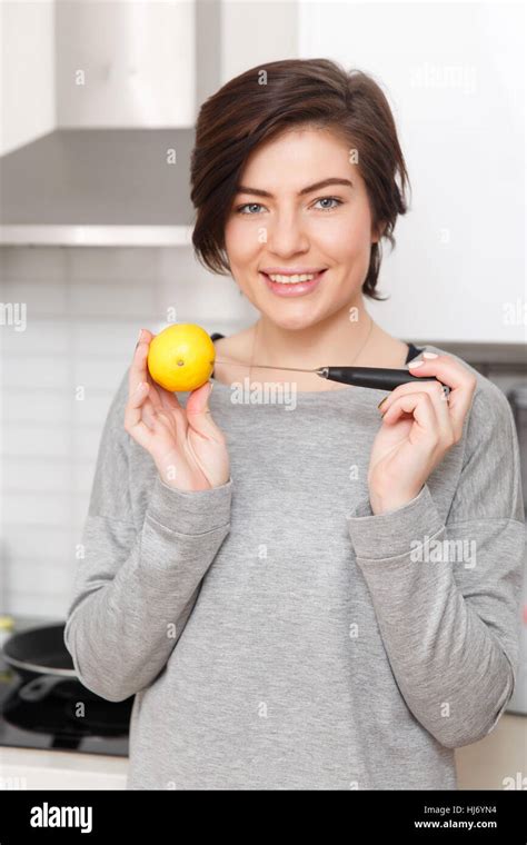Photo Of Brunette With Lemon Stock Photo Alamy