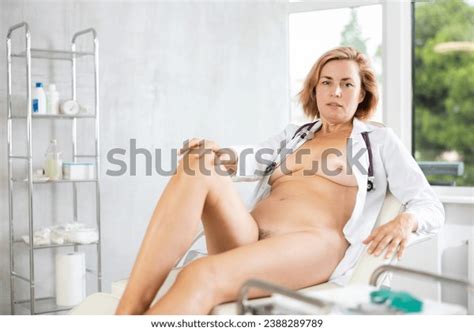 Smiling Nude Doctor Laying On Exam Stock Photo 2388289789 Shutterstock