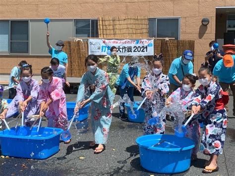 熊谷「打ち水大作戦」、3年ぶりに星川で 参加者にひしゃく進呈 - 熊谷経済新聞