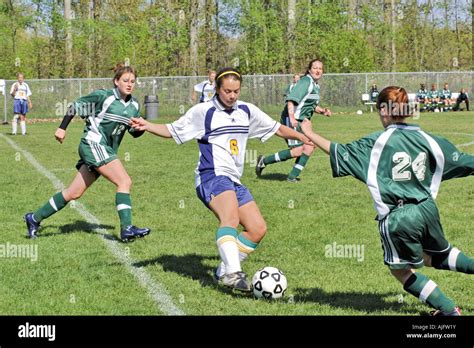 Teenage Girls Involved In High School Soccer Action Stock Photo Alamy