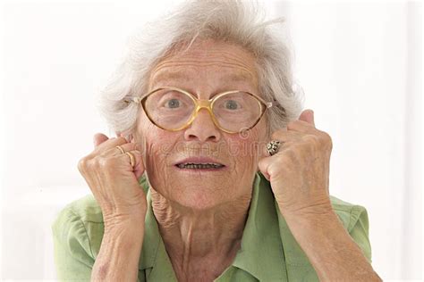 Portrait Of An Angry Senior Lady With Eyes Glasses Stock Image Image