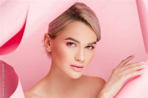 Beautiful Naked Woman With Pink Makeup In Torn Paper Isolated On Pink Stock Photo Adobe Stock
