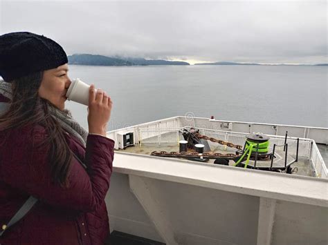 Year Old Latina Woman Drinks Coffee On A Ferry In Cold Weather Crosses The Border And Dreams