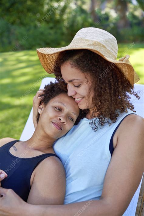 Happy Lesbian Couple Cuddling Stock Image F037 9016 Science Photo