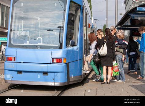 Trams Running Through The City Of Munich Stock Photo Alamy