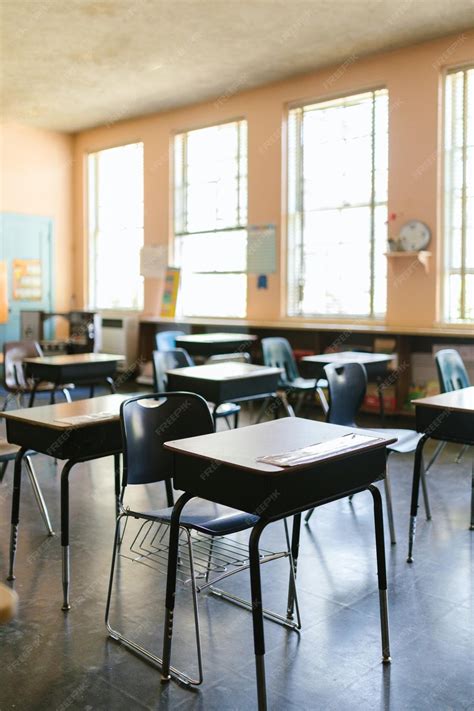 Premium Photo | Desks and chairs in classroom