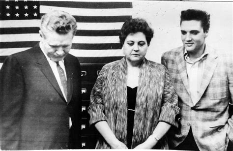 Elvis Presley with his parents before he has to leave for Army basic