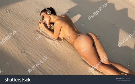 Elegant Nude Woman Laying On Sand Stock Photo 1051770284 Shutterstock